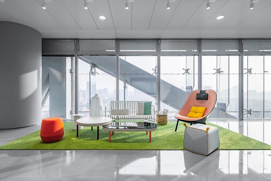 A room with a table chairs and a couch.